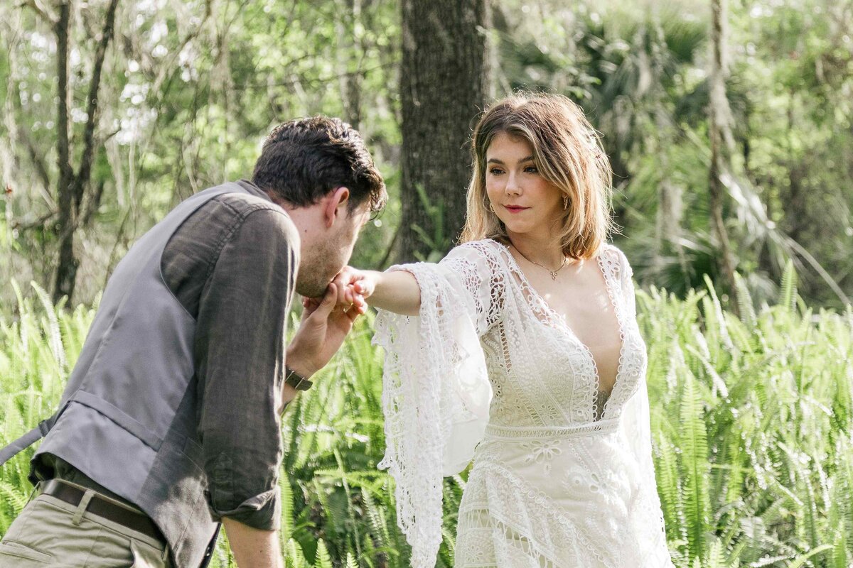 47-groom-kisses-bride-hand