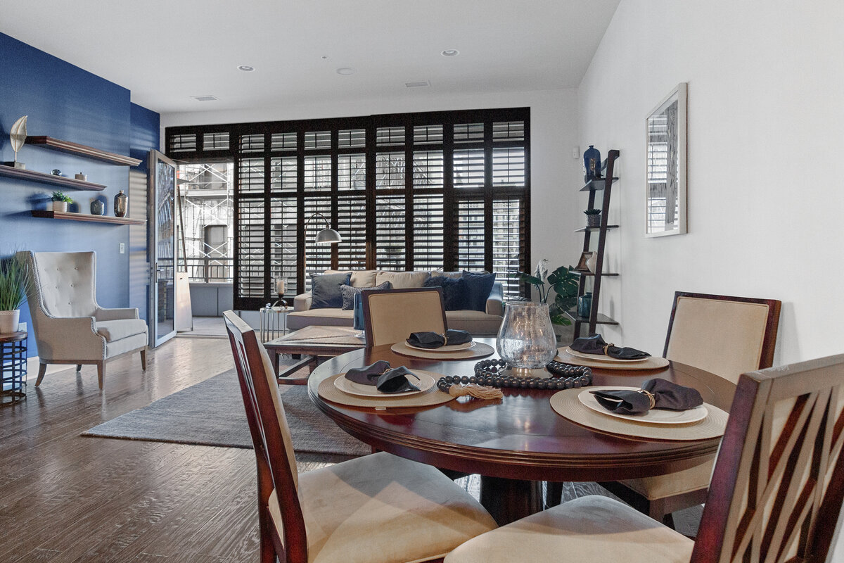 Staged dining room in loft designed for buyer engagement and faster sales