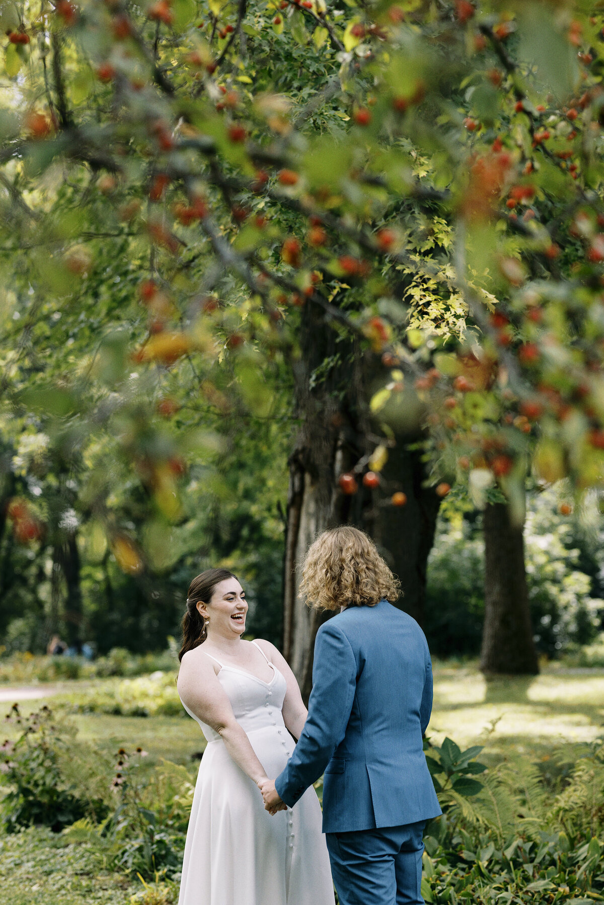 Intimate wedding at outing lodge. photos of bride and groom out on lawn (1)