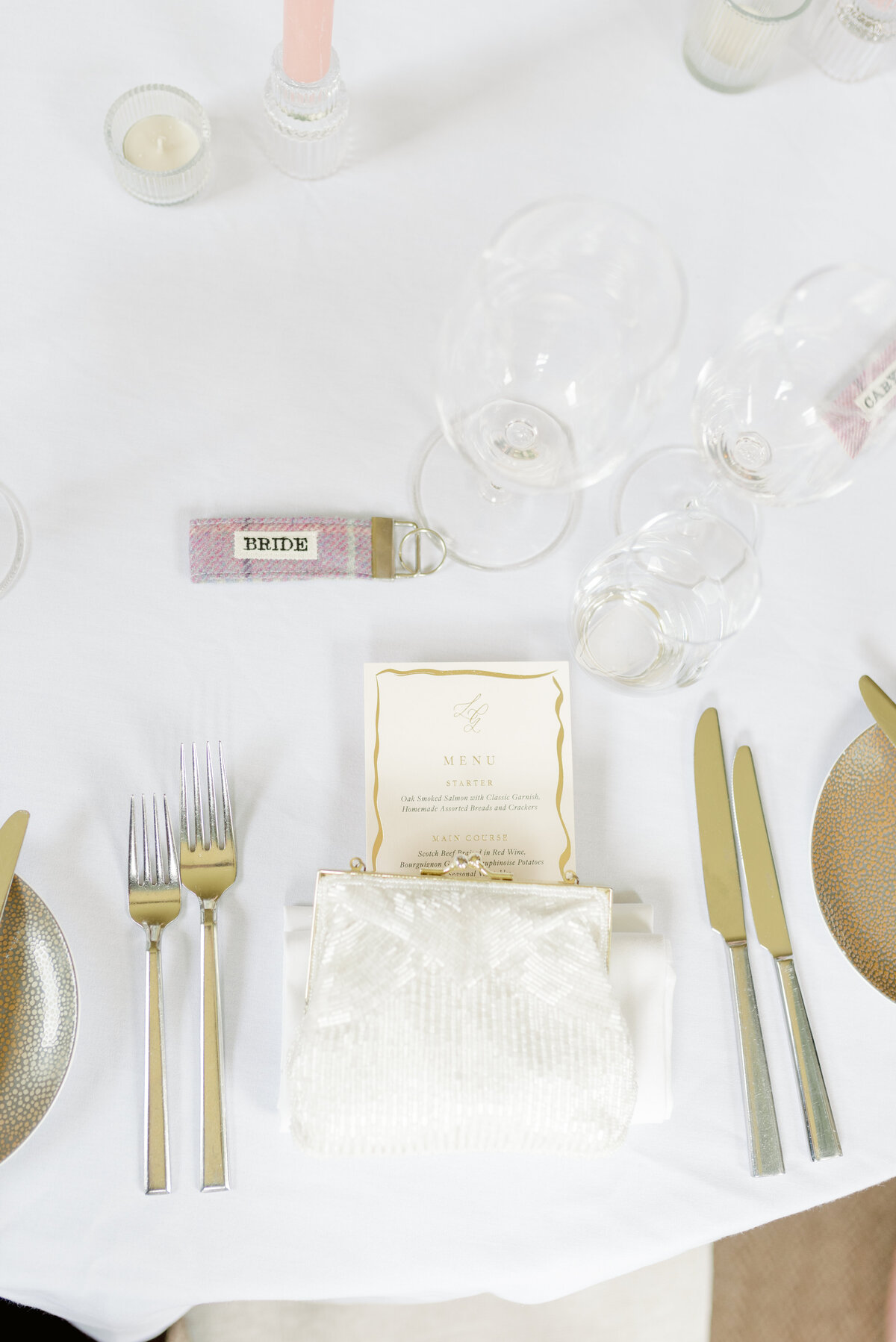 Elegant table settings for wedding at Cromlix House, captured by destination wedding photographer in Scotland.