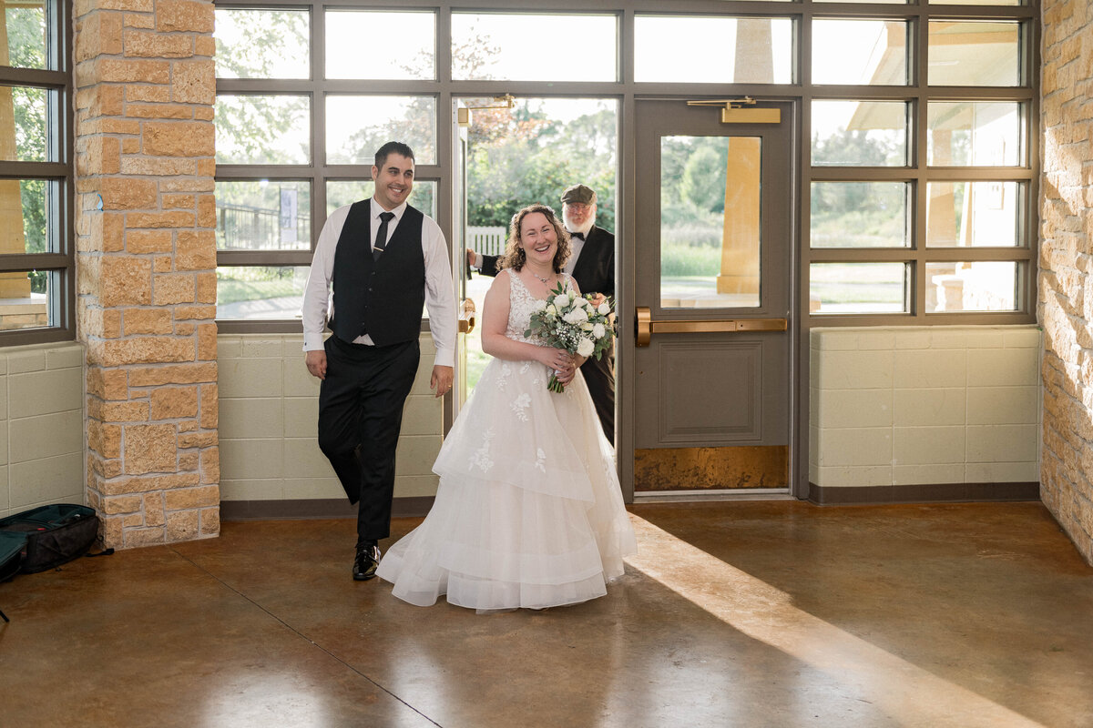 Candid moment of groom preparing