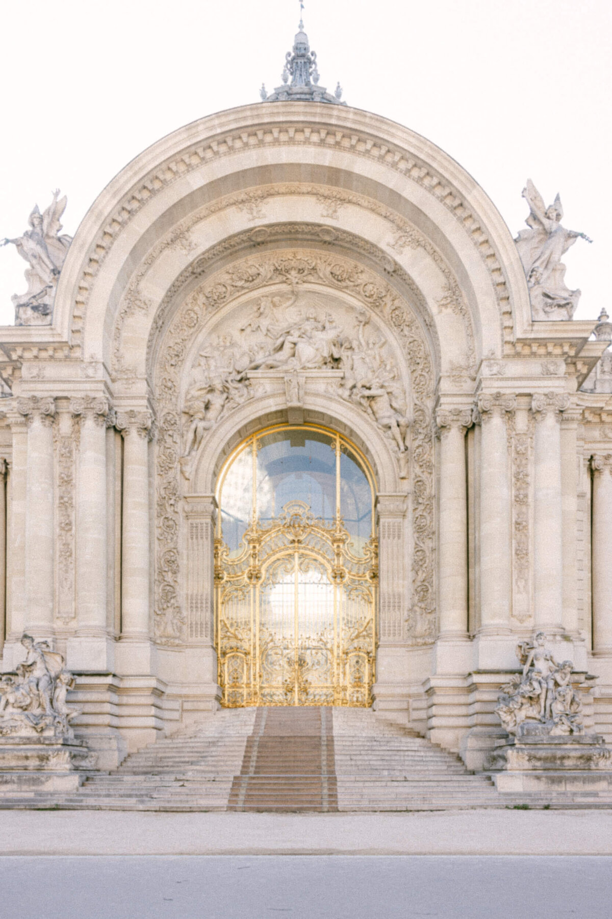 A wedding photo showing off the architecture of Paris