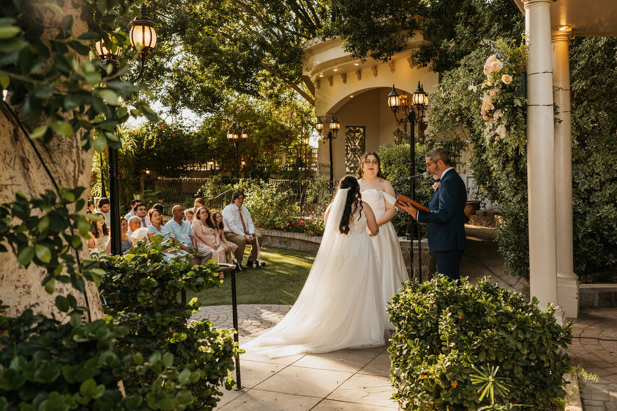 A couple standing up during their wedding ceremony 