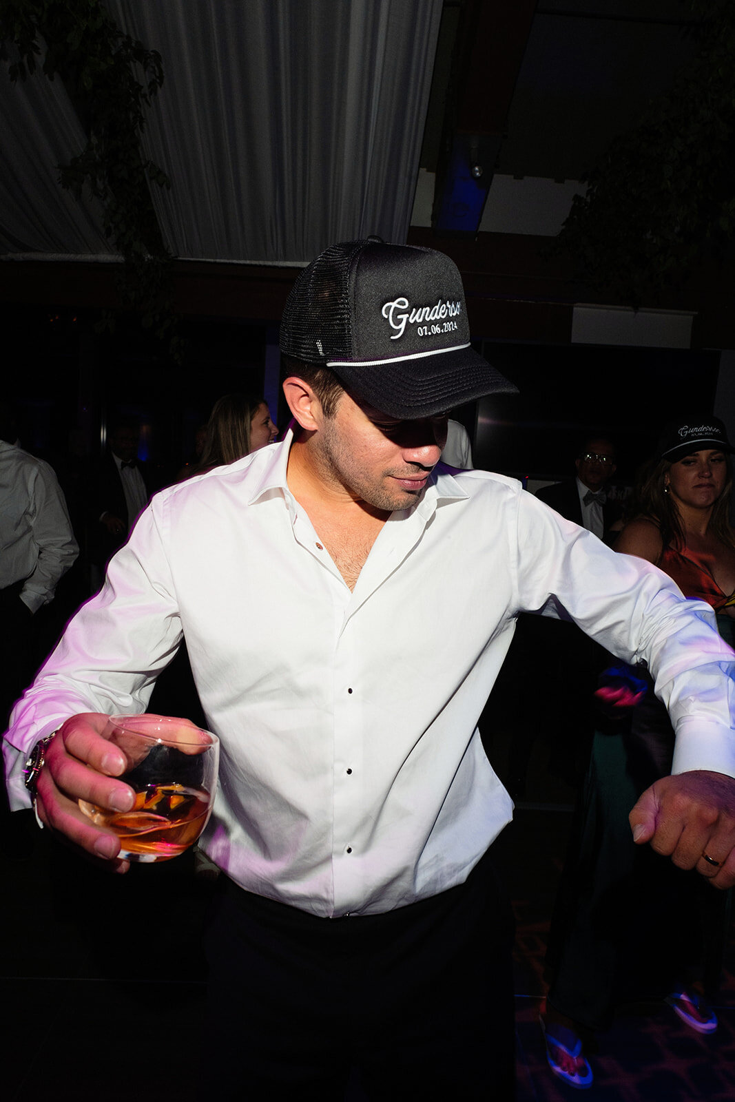 custom-grooms-hat-on-the-dance-floor-aspen-HBICWeddings