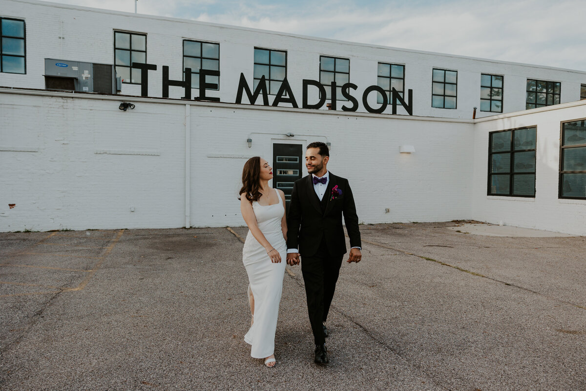 couple walking outside the madison