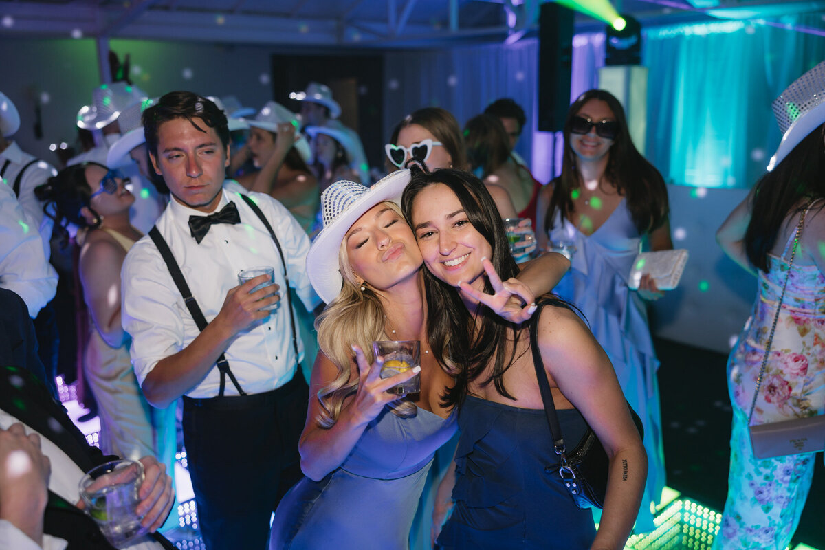 Guests dancing on dance floor at reception at El Chorro