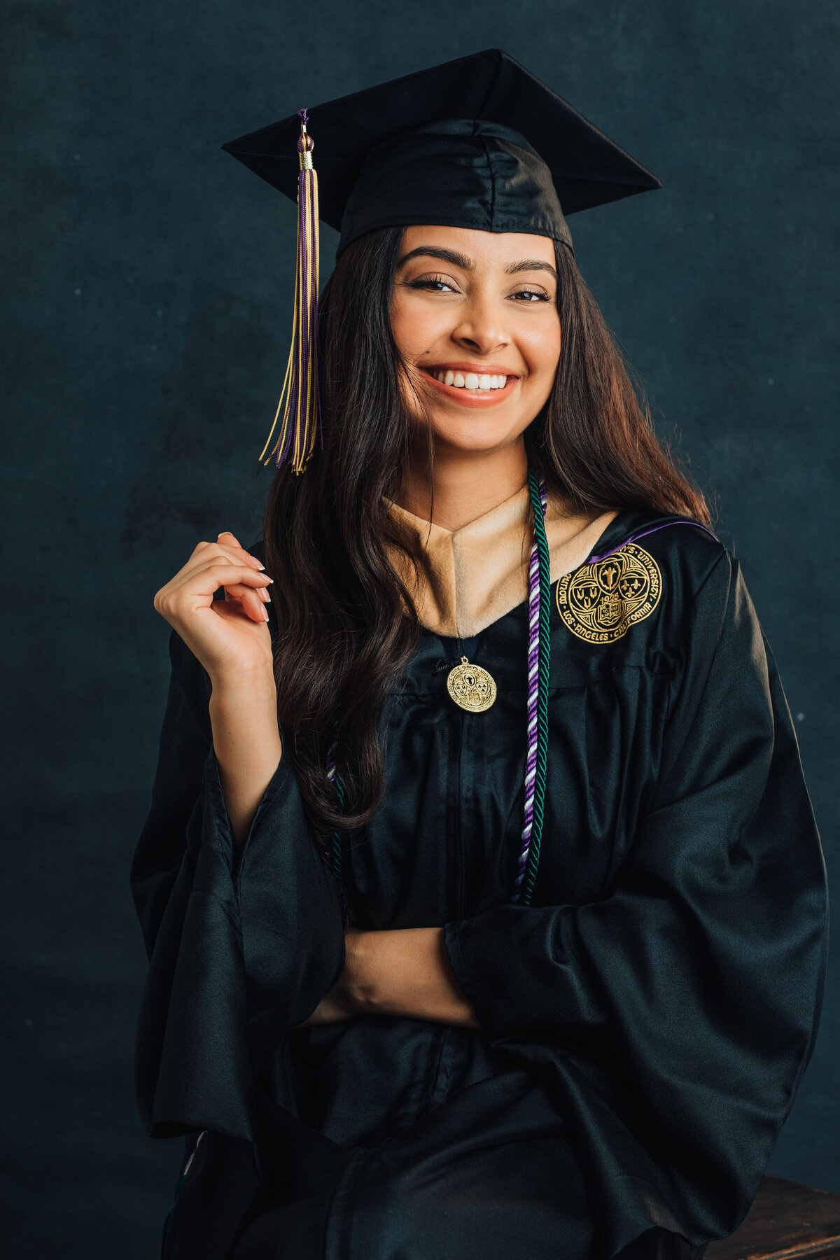 Graduation Portrait Of Young Woman In Black Toga Smiling Los Angeles