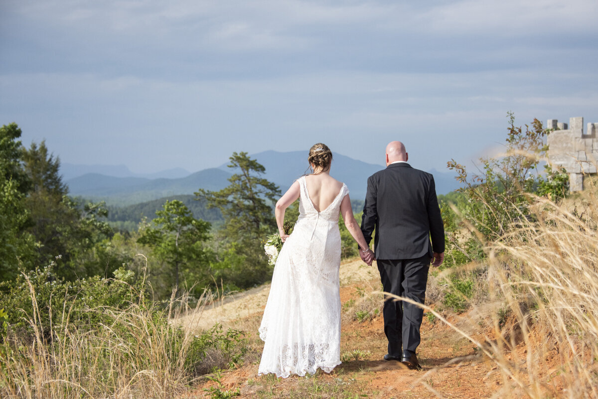 Couple walking at Something Blue wedding venue