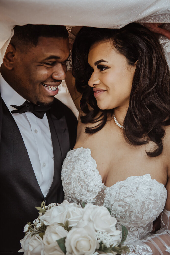 intimate-under-veil-wedding-moment-surety-hotel-des-moines-wedding-photographer-storyteller-collective-photo-co