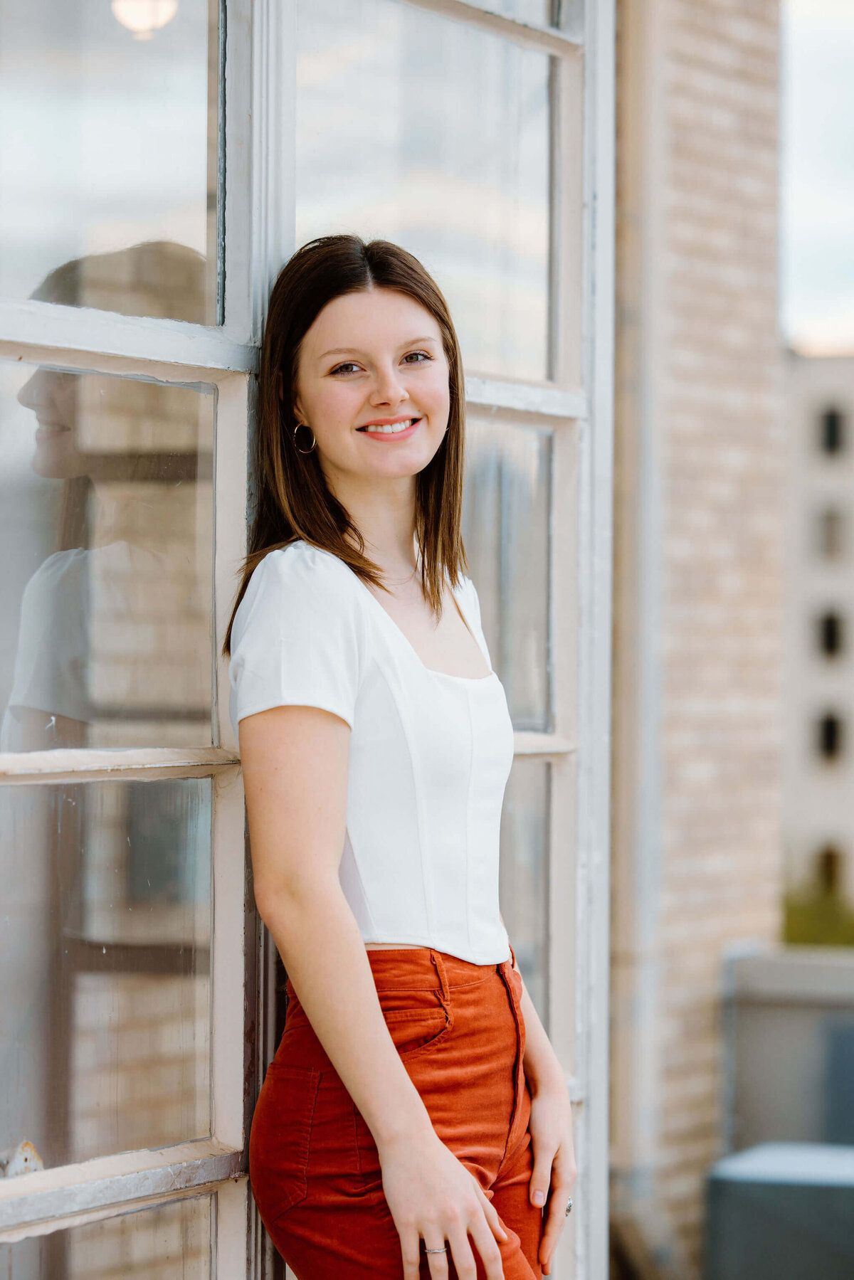 Senior portrait session on downtown Longview, TX rooftop