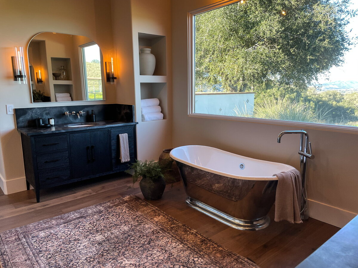 bath tub under window