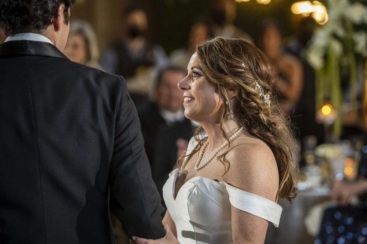 Bride staring up at groom.