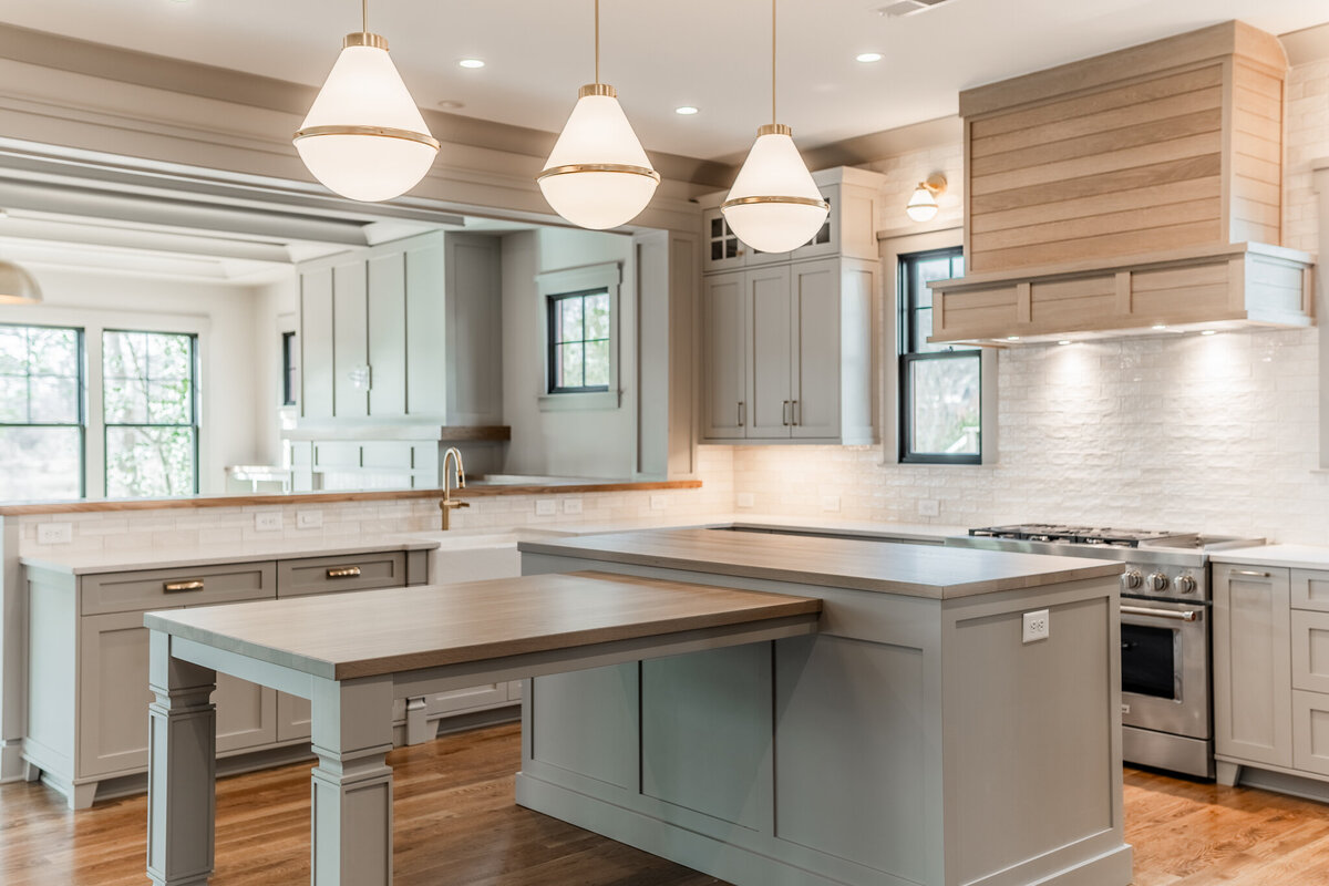 Luxury Kitchen with Custom Cabinetry and Wood Butcher Block Countertop