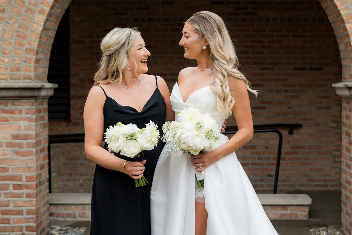 bride-and-sister.all-smiles-revel-motor-row-HBICWeddings
