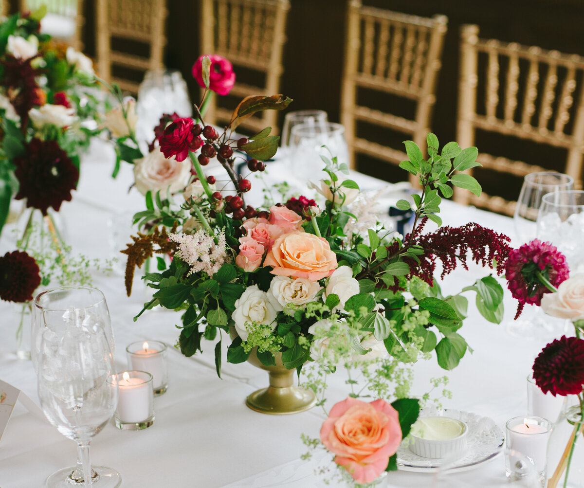 A bright garden floral centrepiece on a table at the Forest and Stream Club. 