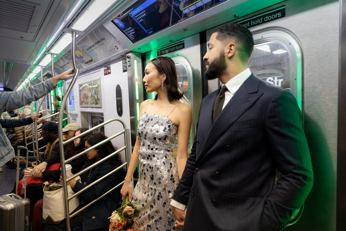 Modern, urban editorial elopement session on the NYC subway, capturing bold style and romantic vibes.