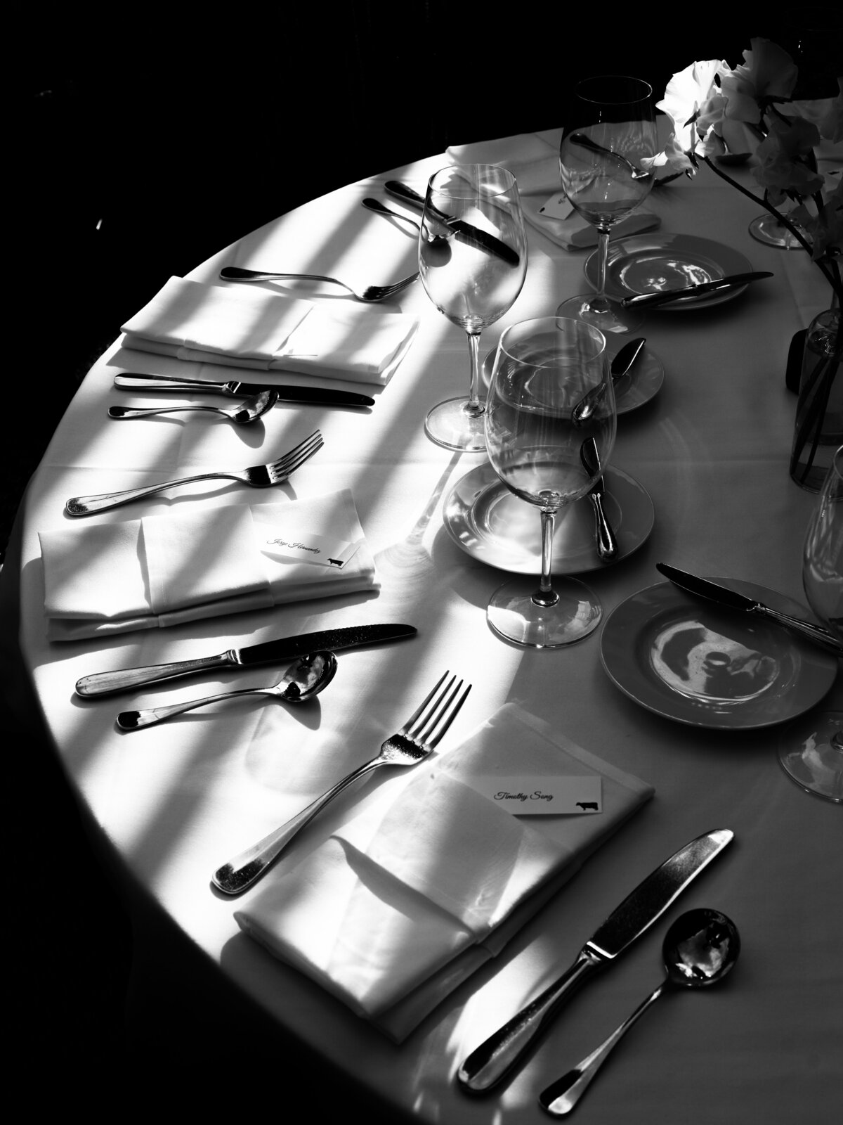 shadows on a round wedding reception table