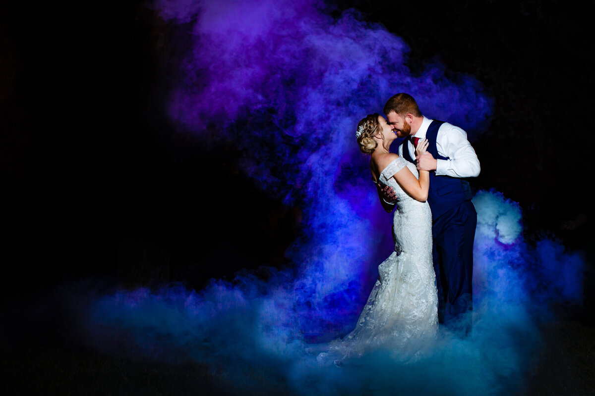 Bride and Groom night time portrait with smoke bomb in San Antonio