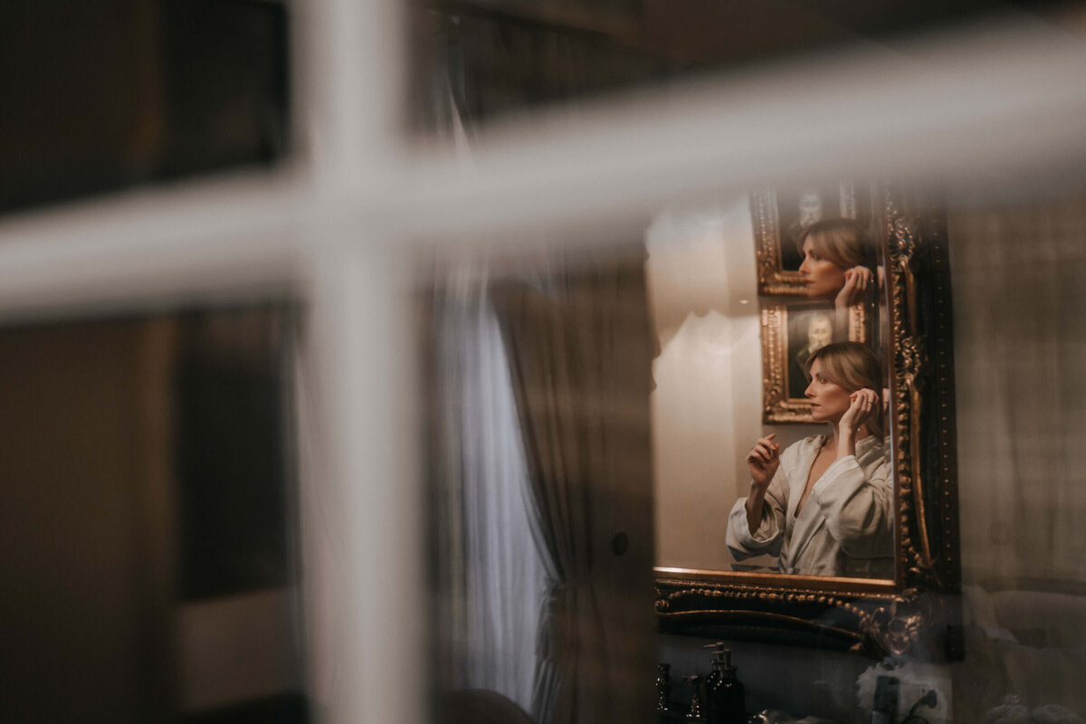 bride getting ready borgo santo pietro wedding in tuscany exclusive 