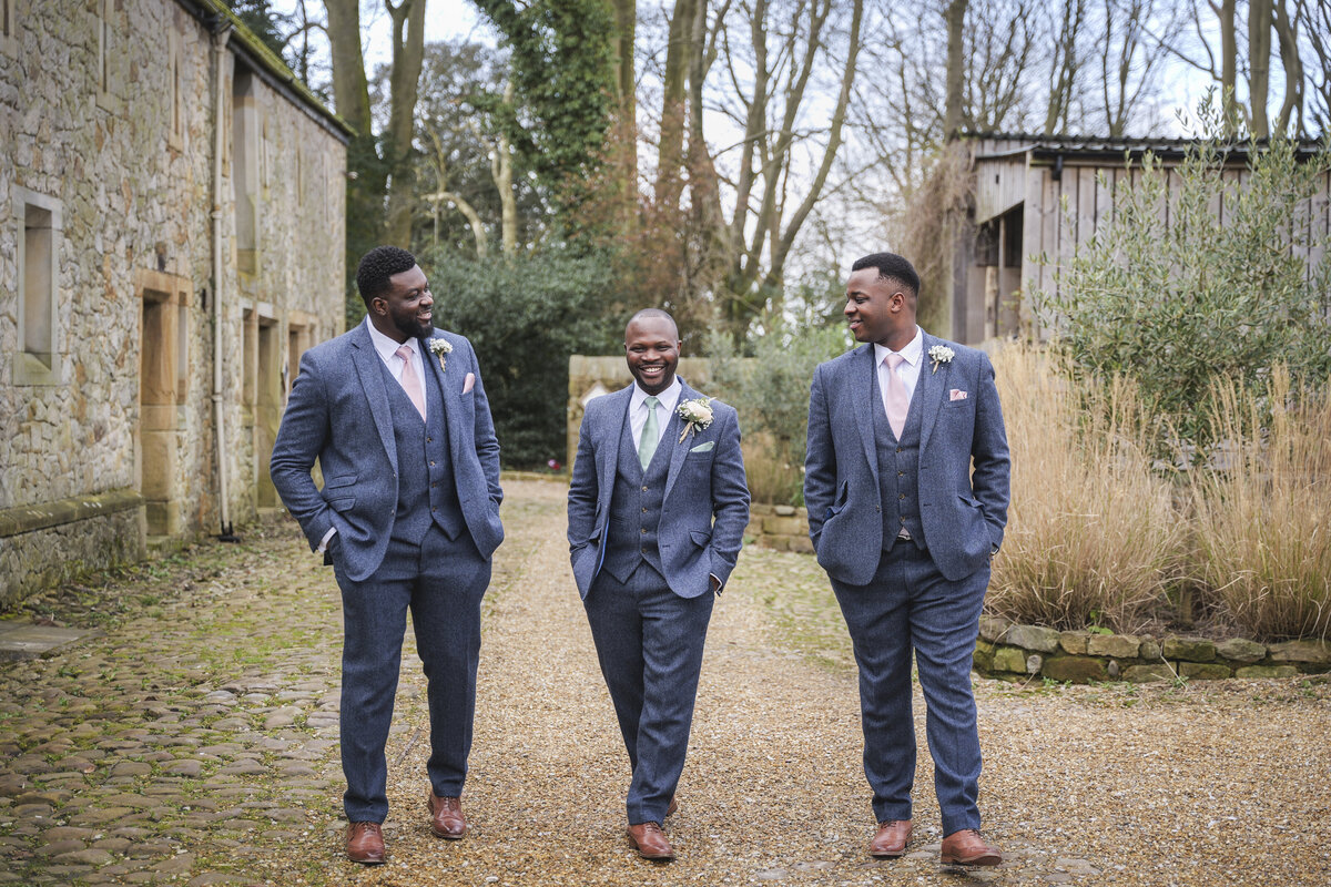 Dexter and his groomsmen walking