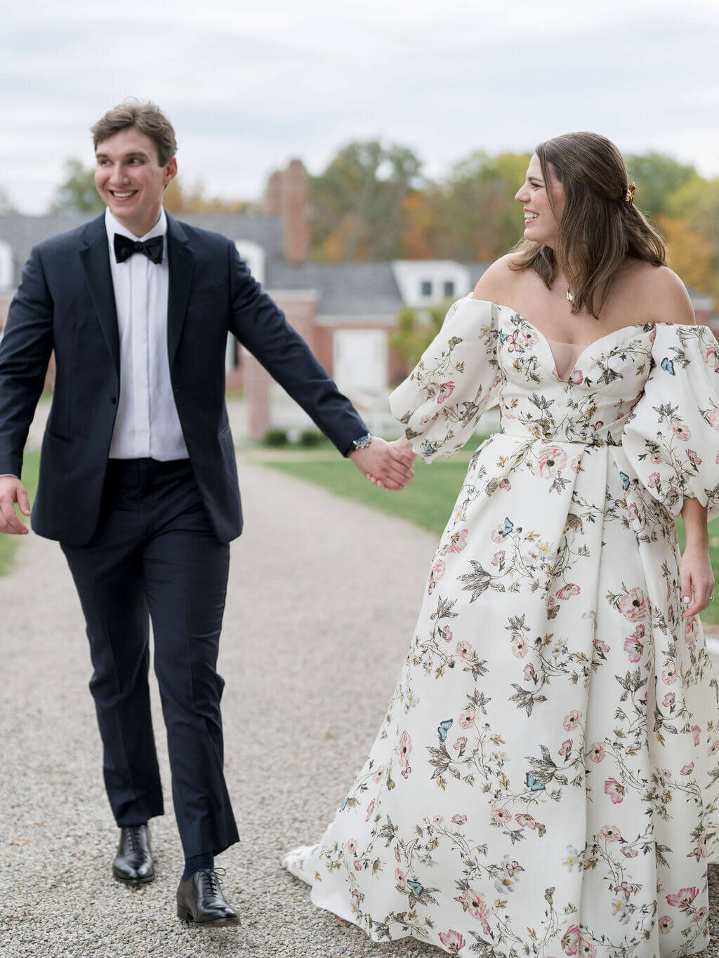 23.wedding-couple-holding-hands-floral-gown-poeme.