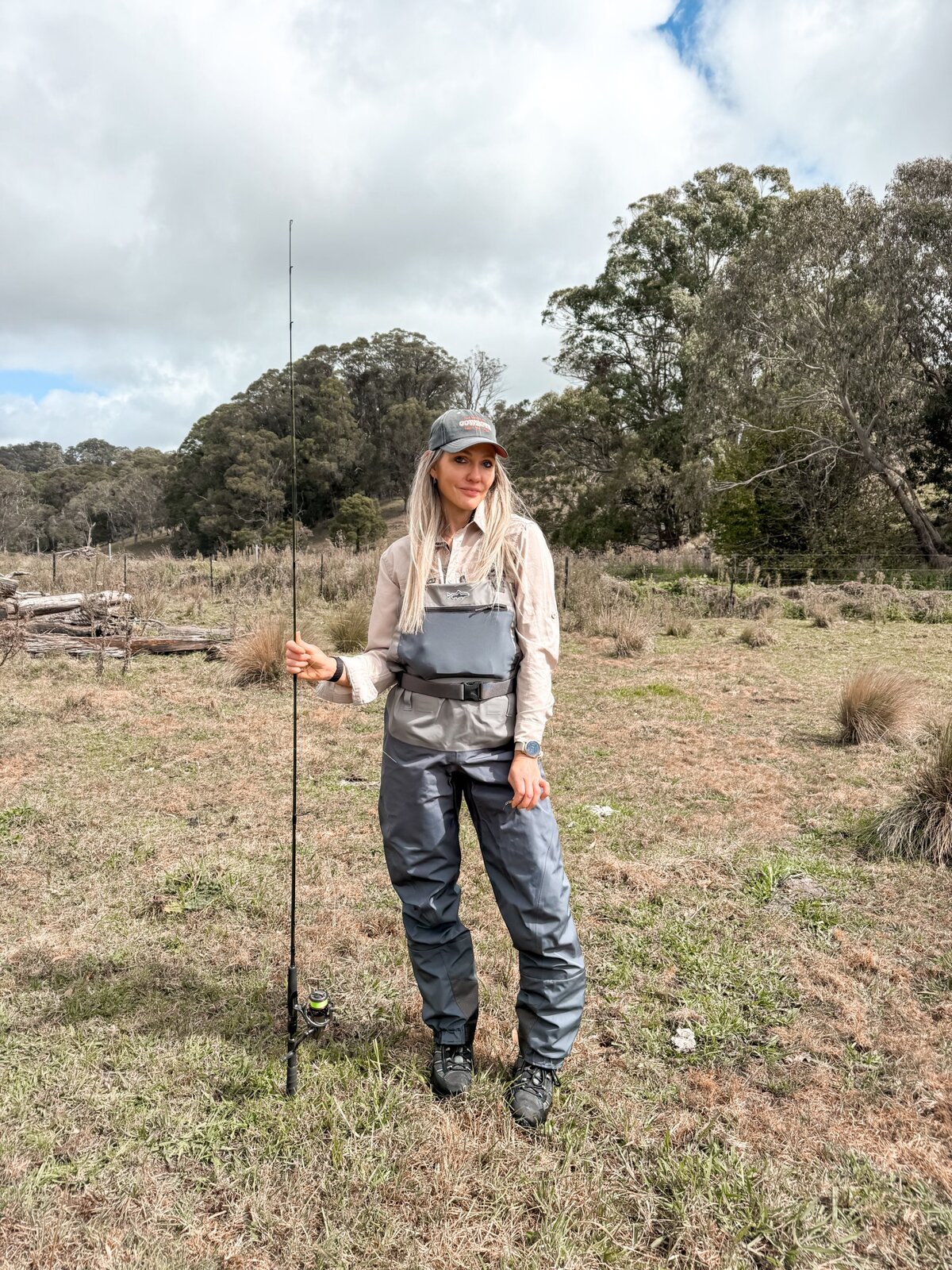 Libby fishing in waders
