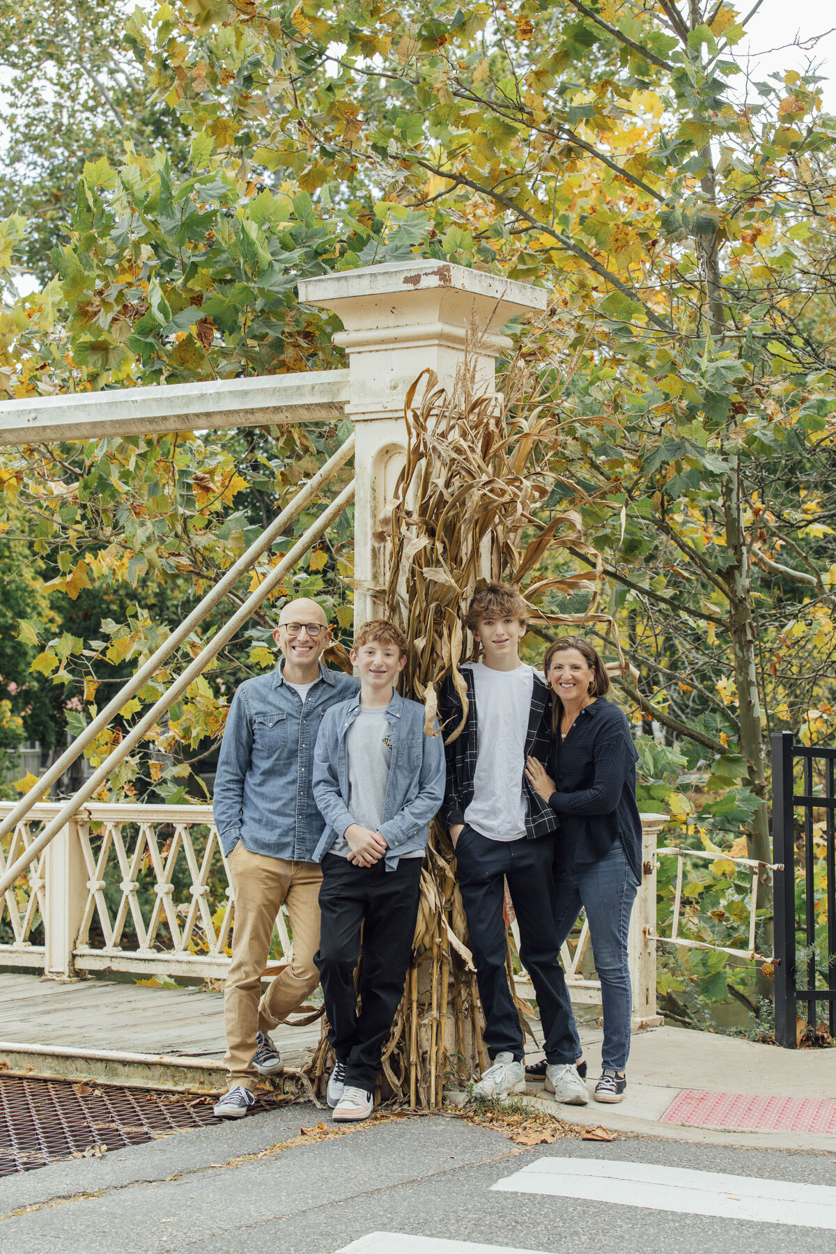 Clinton | Family posing for fall portraits outdoors | New Jersey
