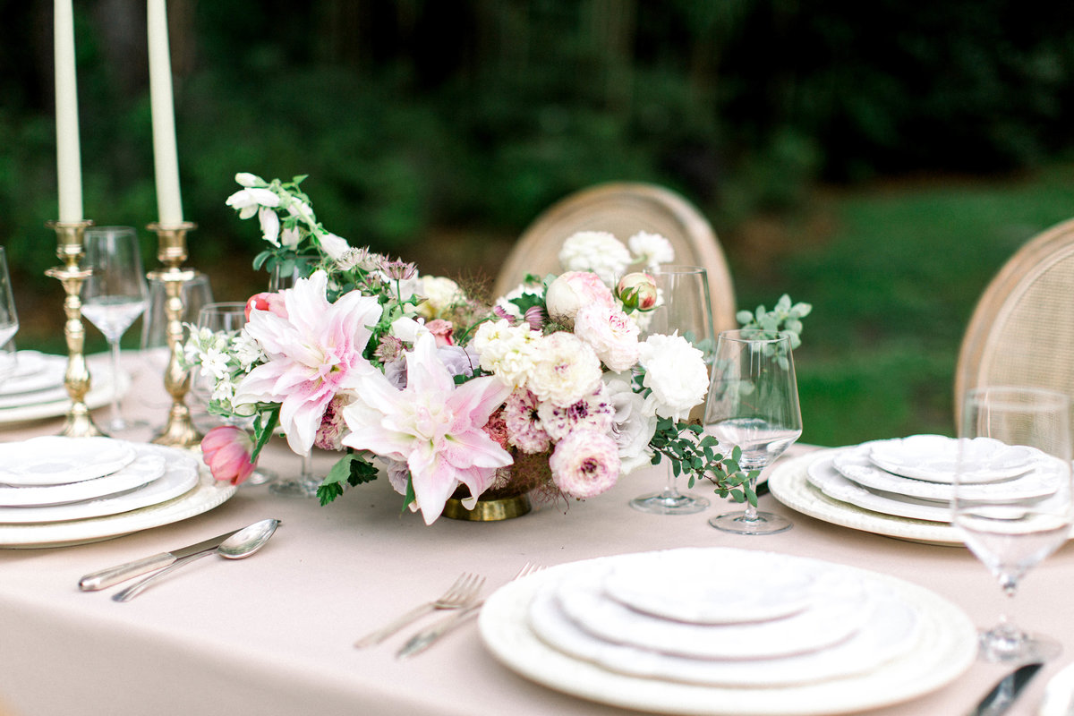 Southern inspired floral centerpiece at luxury wedding in Charleston, South Carolina's Magnolia Plantation