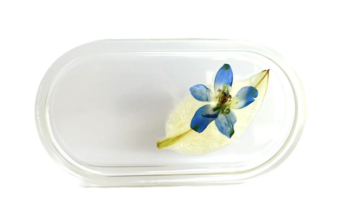 resin wedding flower preservation in a jewelry dish