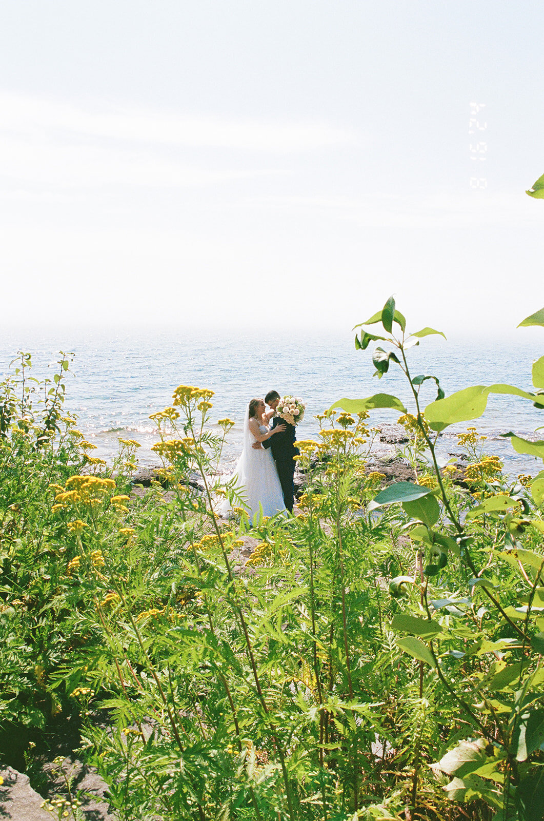 couple kissing on the Minnesota  north shoreline