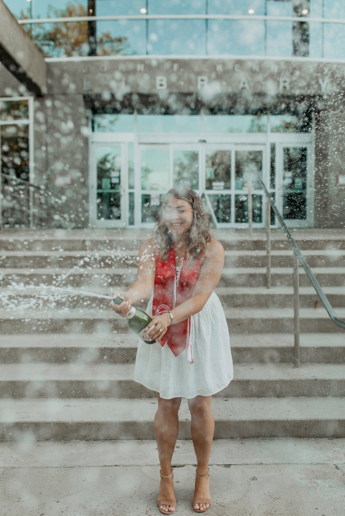 college grad champagne celebration photo