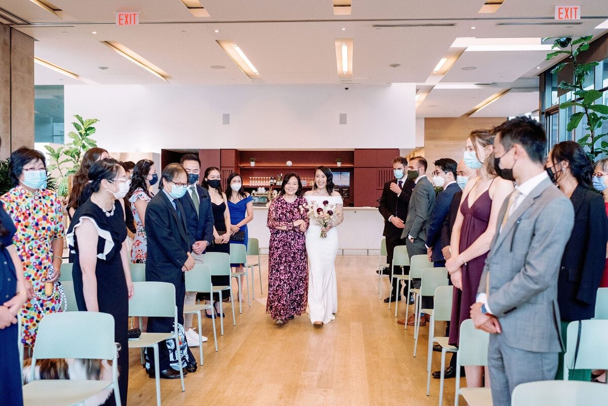 Bride Enters Elegant Modern Fall Wedding Ceremony at Gardiner Museum Intimate Wedding Toronto Wedding Venue Jacqueline James Photography
