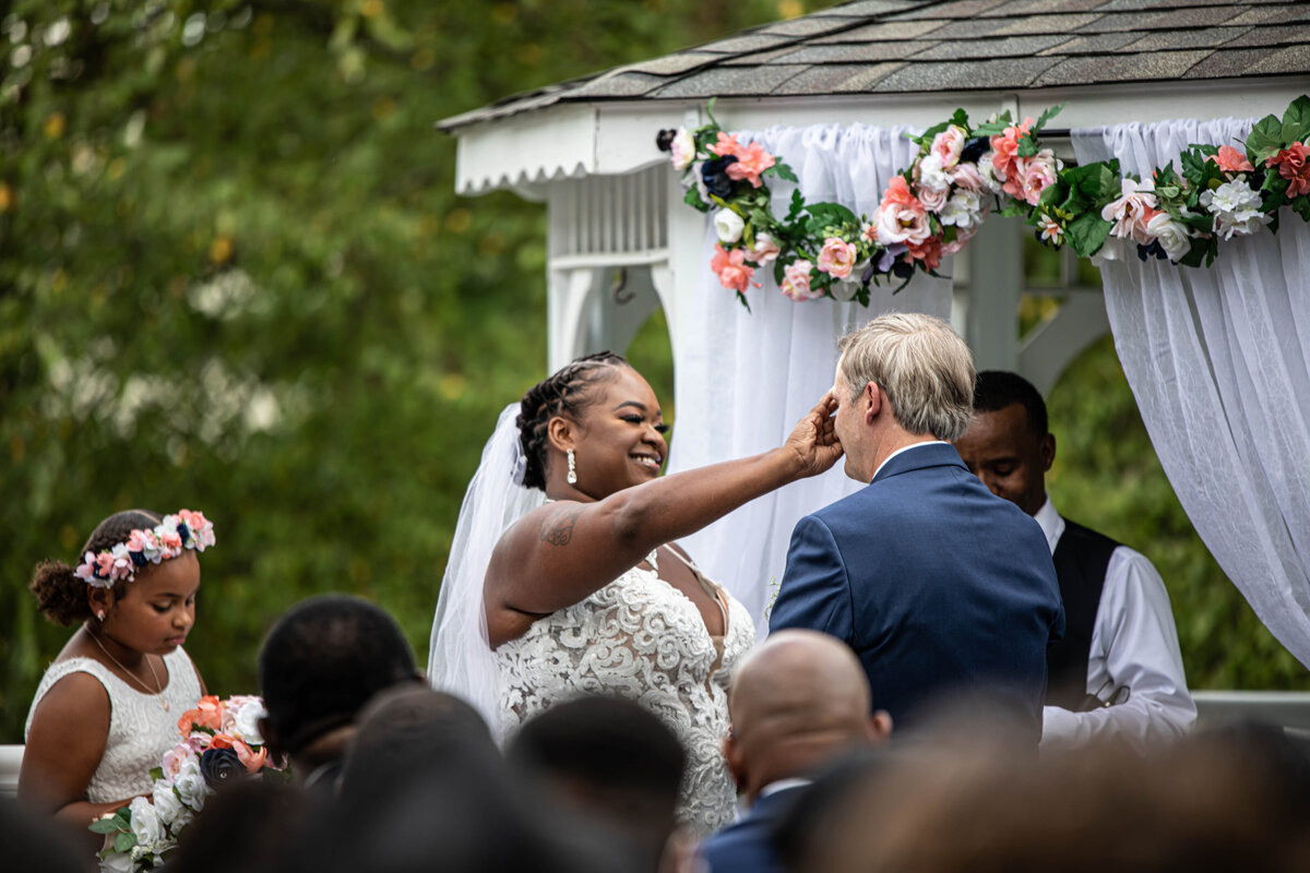 Bride-wiping-grooms-eyes