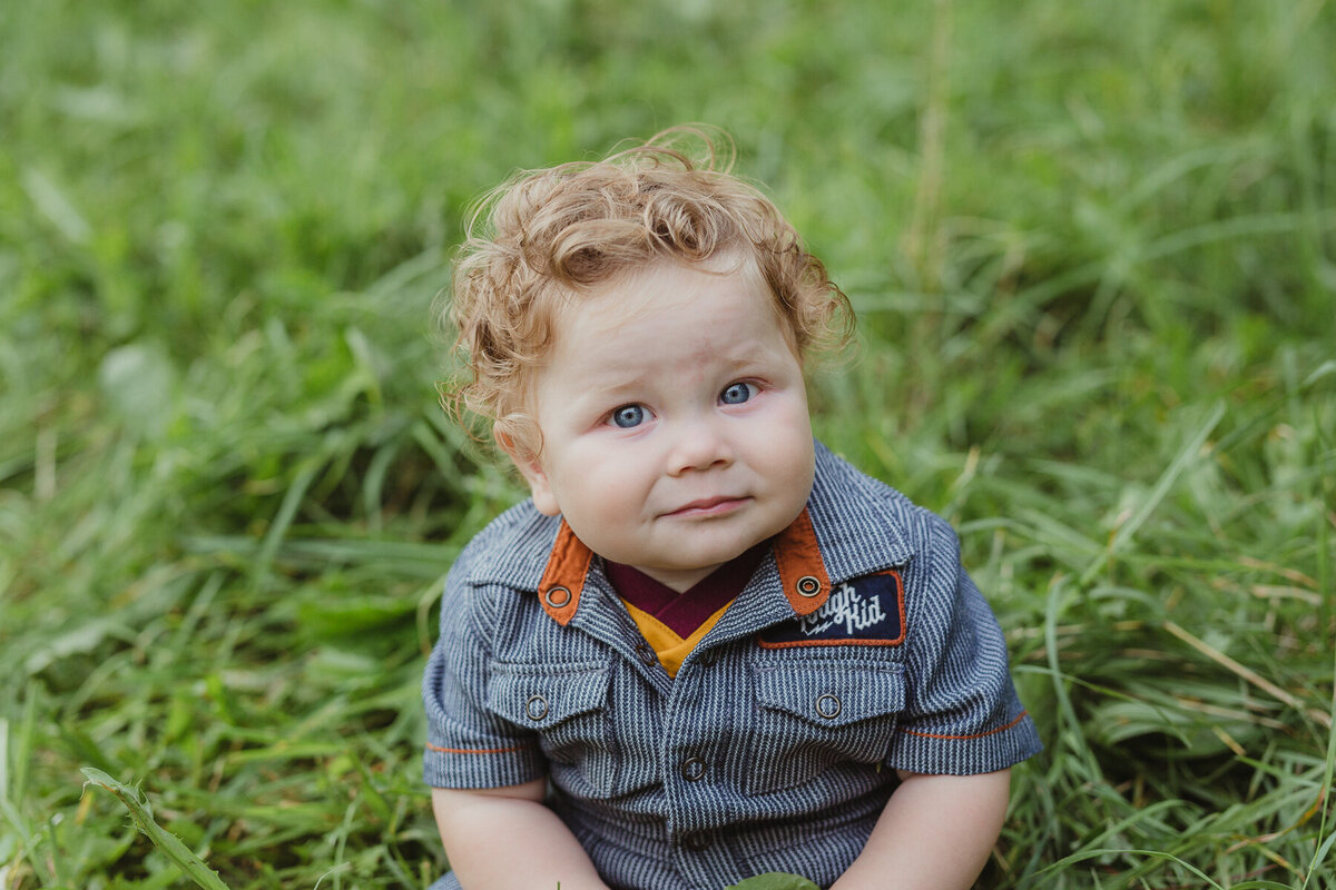 little boy in grass