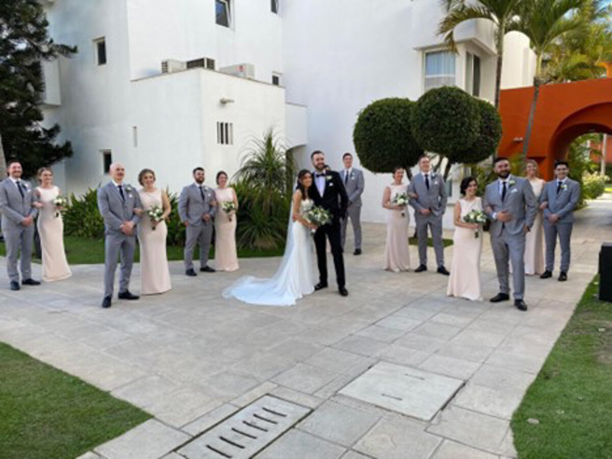 Bride and groom  with entourage