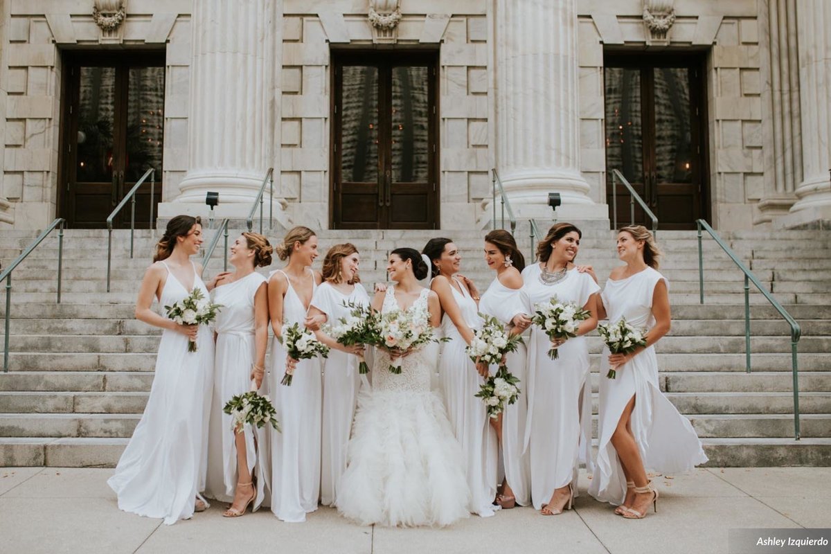 bridesmaids wearing white dresses