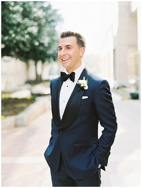Groom in Tux with White Boutonnière © Bonnie Sen Photography