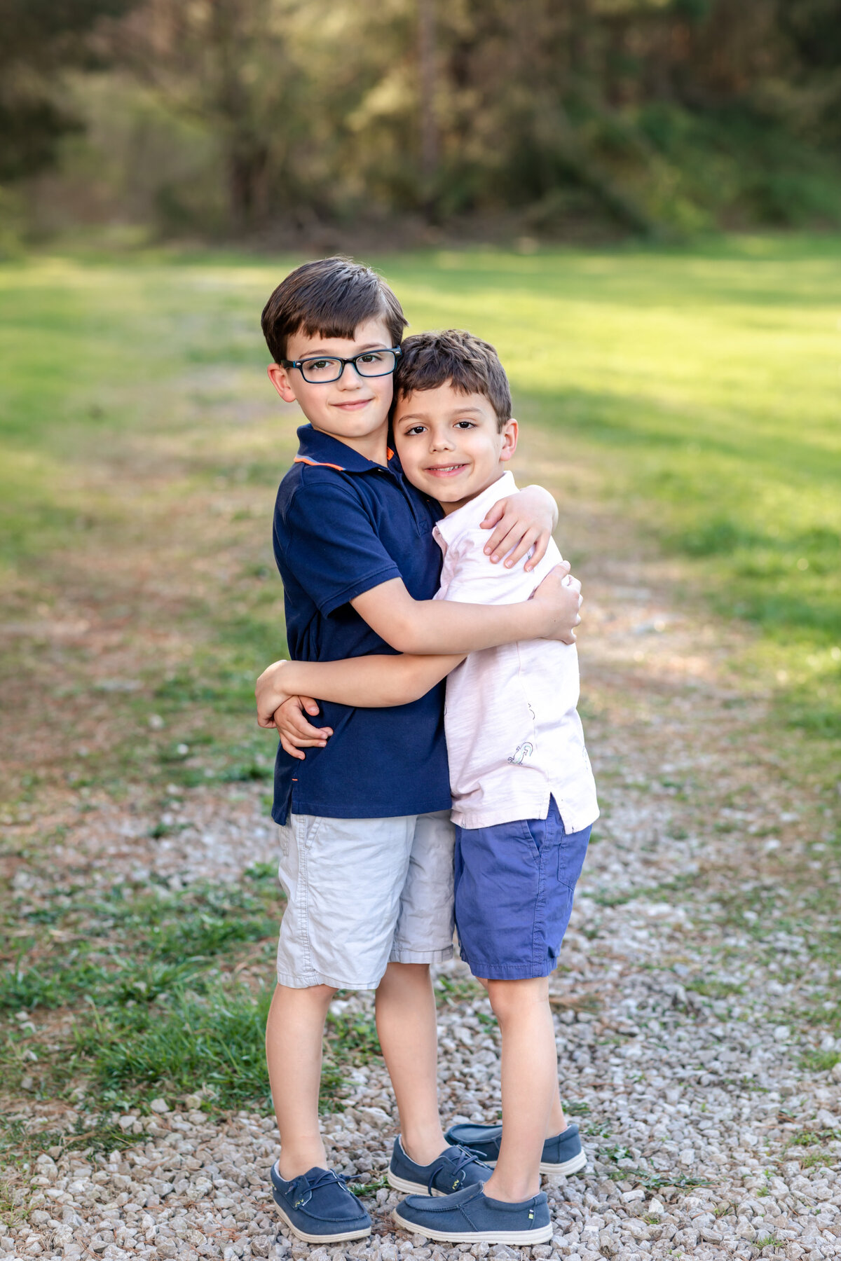 two brothers hugging for family photos