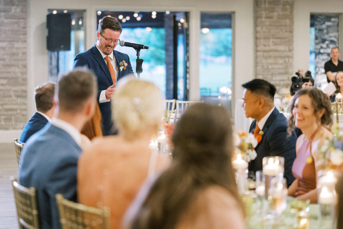 best-man-laughing-at-microphone