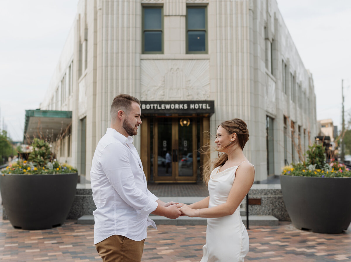 Bride and groom sharing a joyful moment outdoors, photographed by Ryann B Photography, serving Indianapolis and beyond.