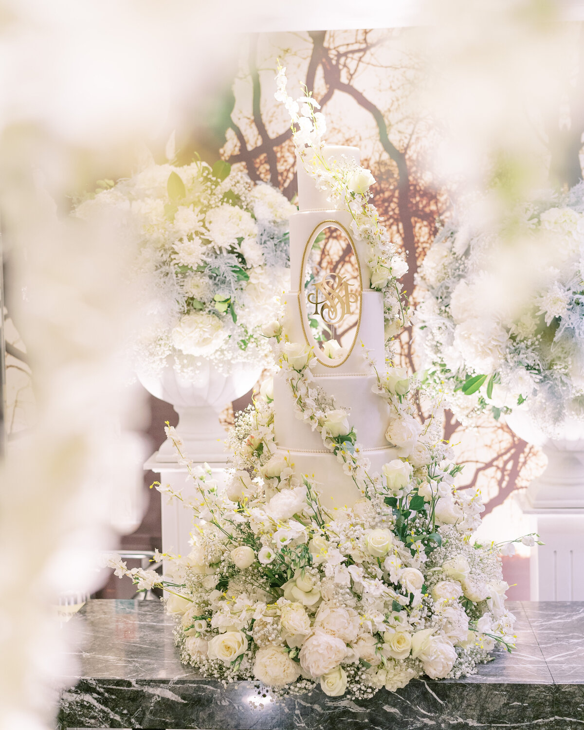 Stunning floral installation and wedding cake for luxury wedding in London