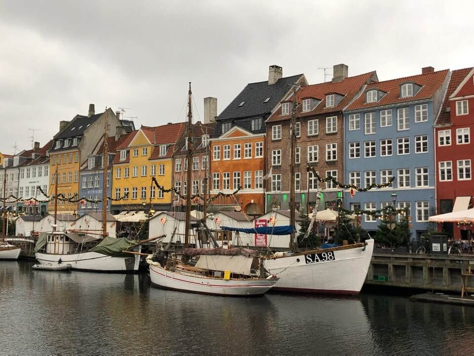 Nyhavn iconic buildings by sailboats on the water
