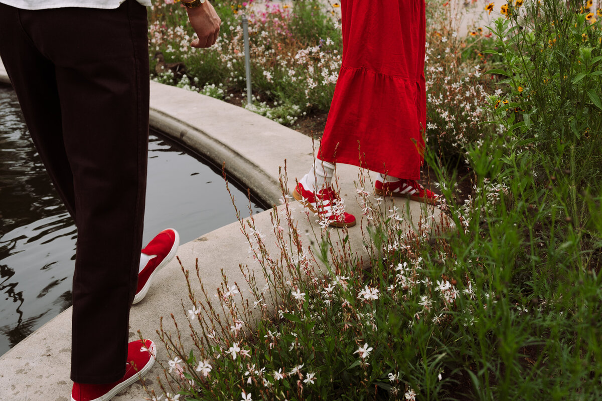 couple walking along pond