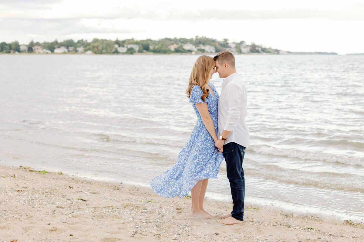 boston quincy massachusetts beach engagement session new england photographer champagne toast