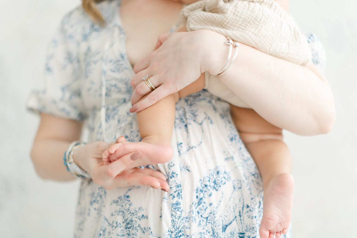 Mama holds her baby