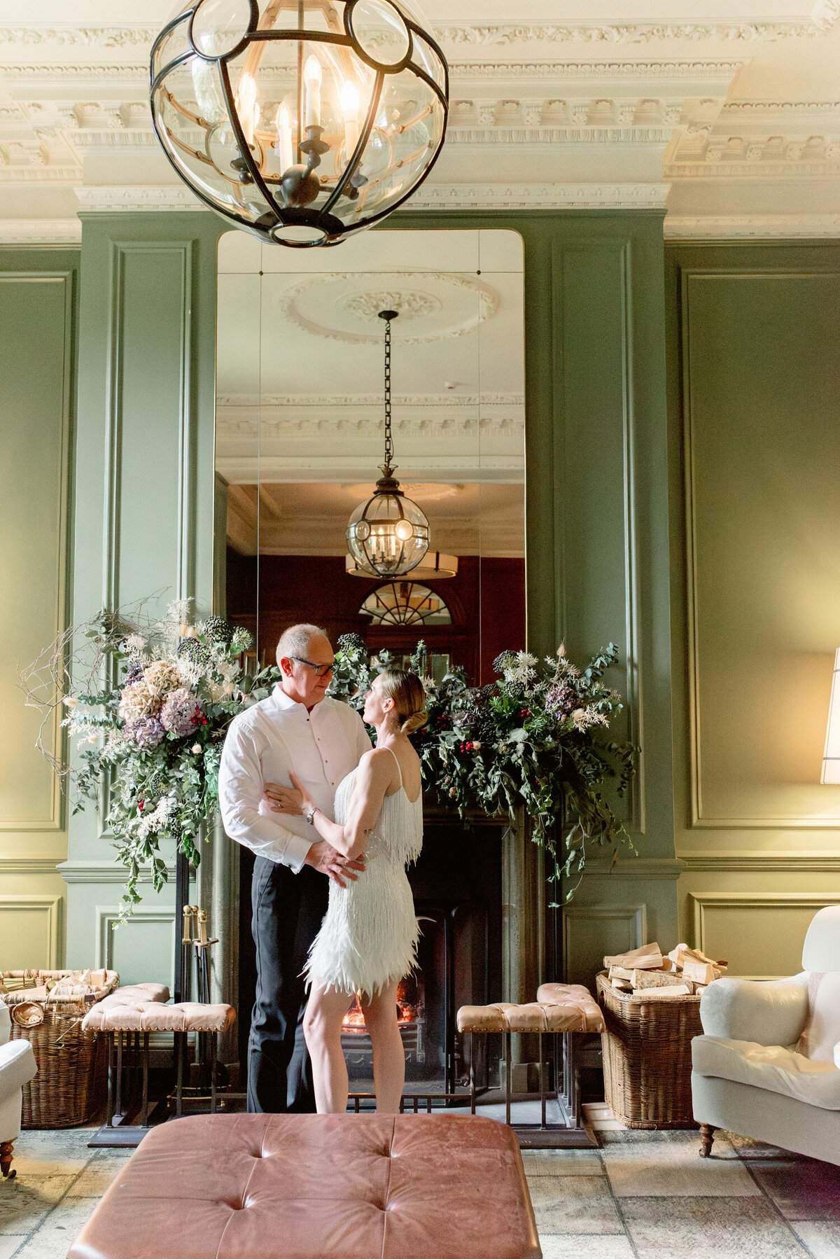 Bride and Groom in the interior of Gleneagles on their wedding day. Image by award winning luxury wedding photographer Scotland, Jill Cherry Porter.