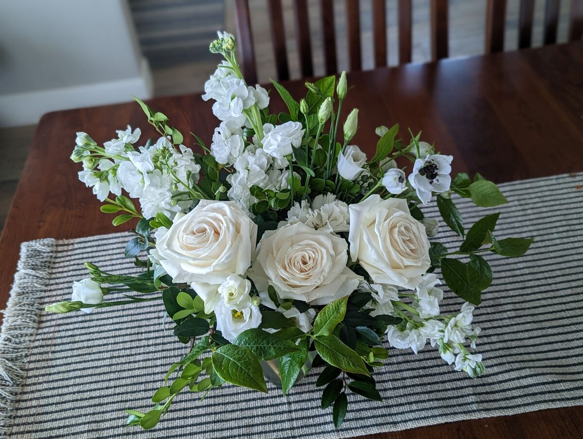 white funeral flower arrangement in vase 2