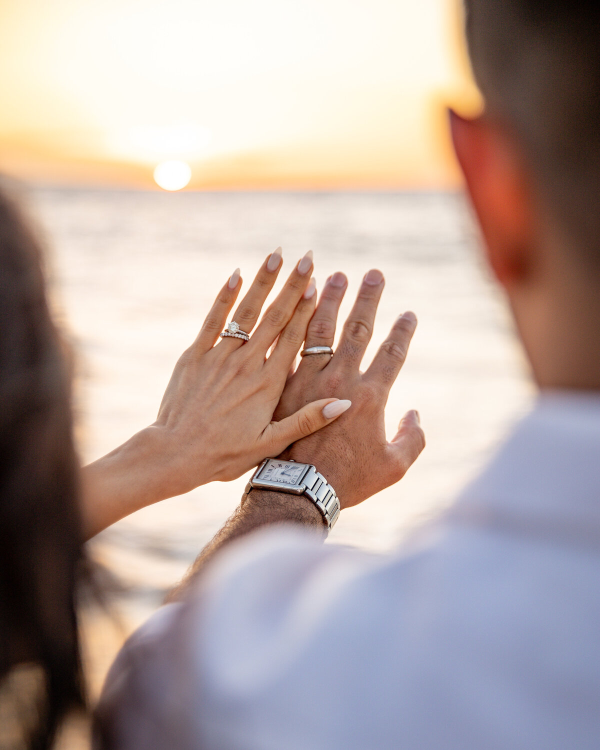 Maui Wedding Photographer captures couple looking at wedding rings