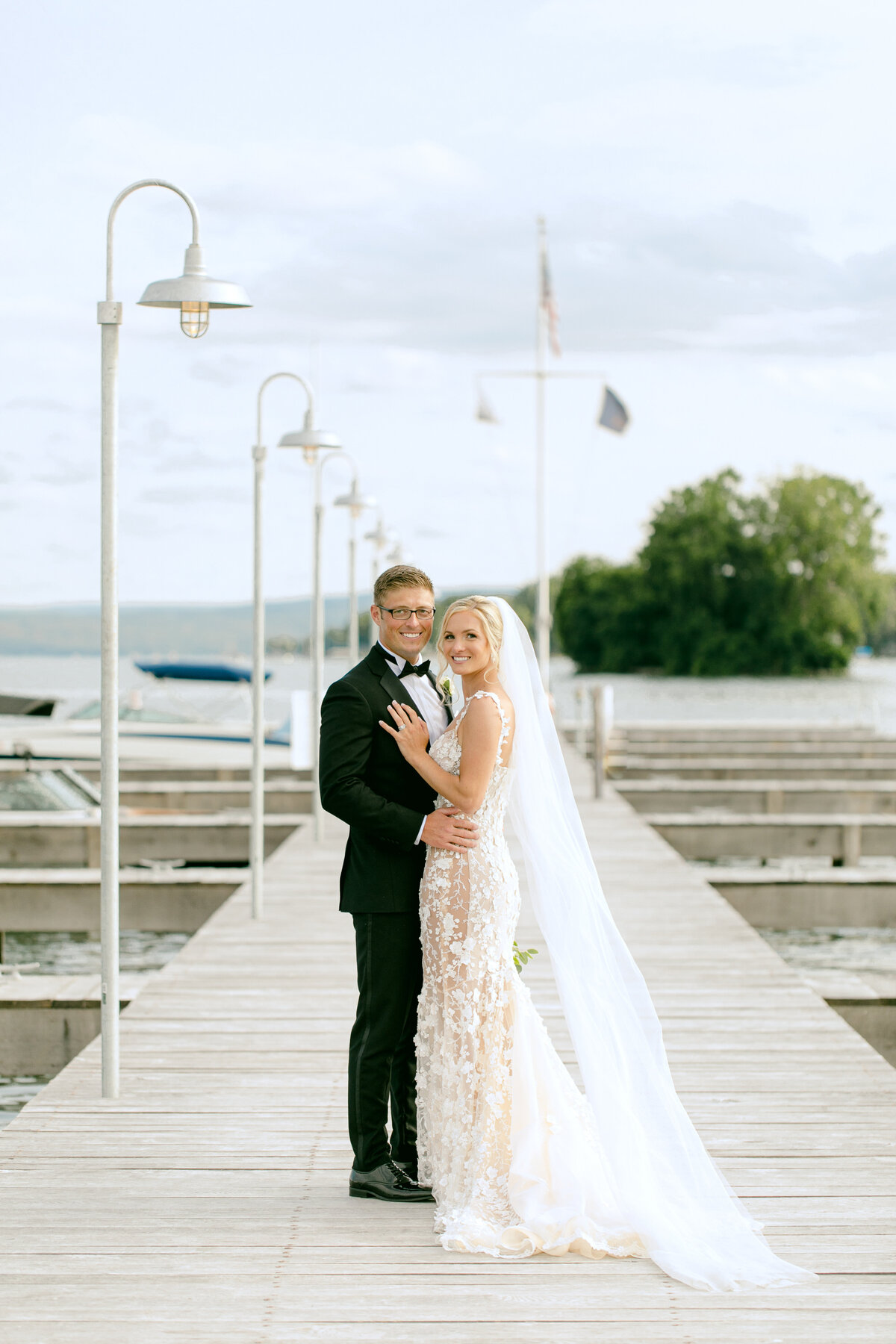 The Lake House on Canandaigua Wedding_Bride and Groom on Dock Photos_Verve Event Co (5)