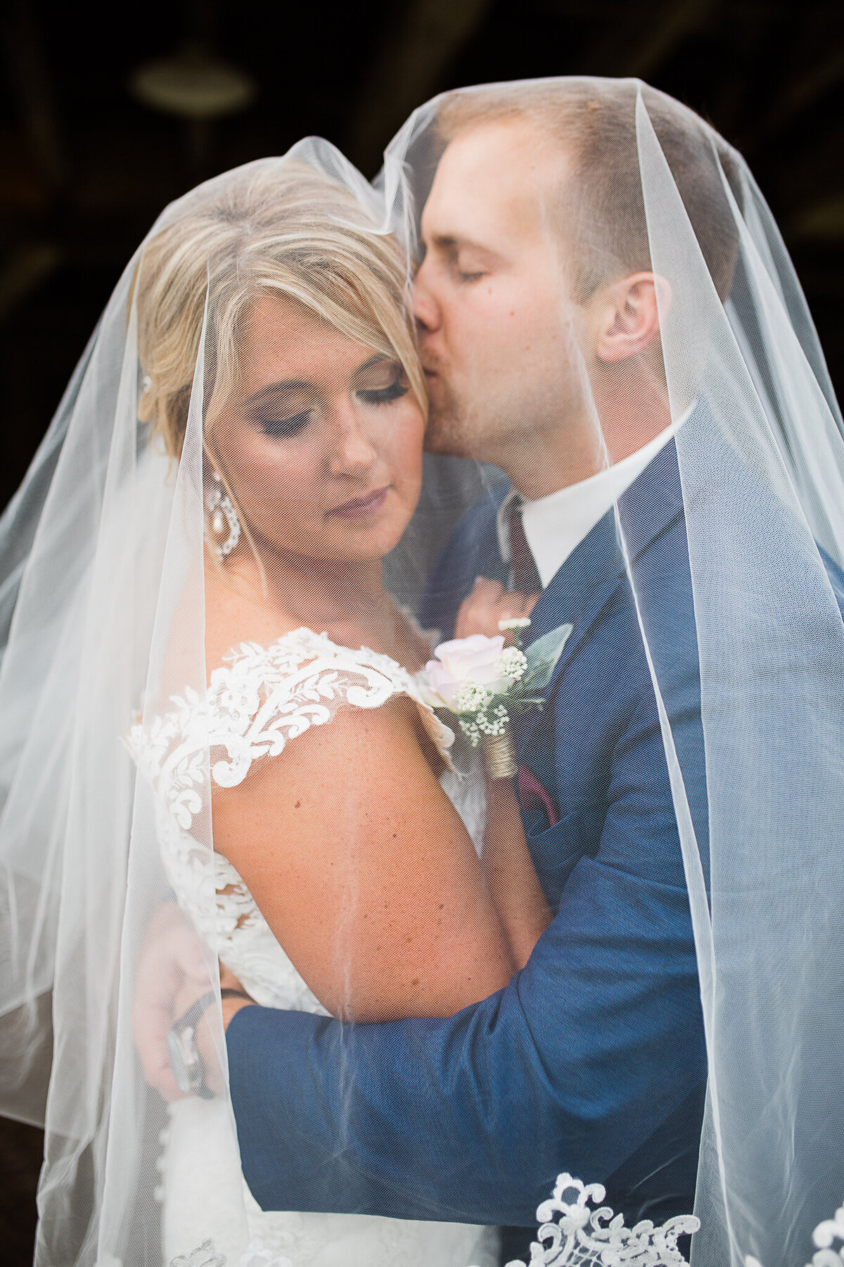 chicago-wedding-photography-veil-shot-bride-groom-kissing